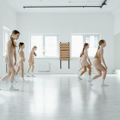Modern minimalist exercise studio with dark flooring